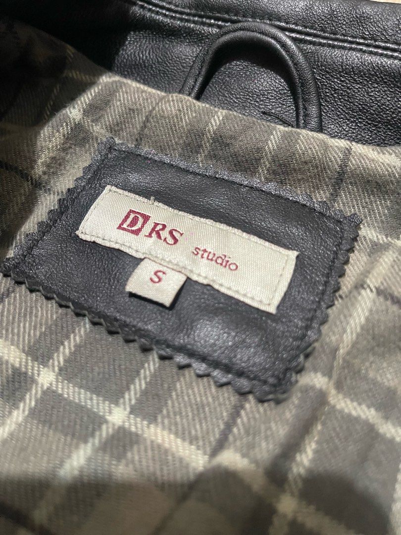 DRS Studio Black Leather Jacket Size S (Category: Coats, Jackets and Outerwear) located in Baguio. Submitted by find_found001 (Listing ID 1469338859, Image 3). Description: - Brand: DRS Studio - Size: S - Material: Black leather with clean stitching - Hardware: Sturdy front zipper with Baleno details - Design: Classic fold-down collar - Interior: Grey plaid lining with a button-secured pocket - Perfect stylish outerwear for cooler weather.