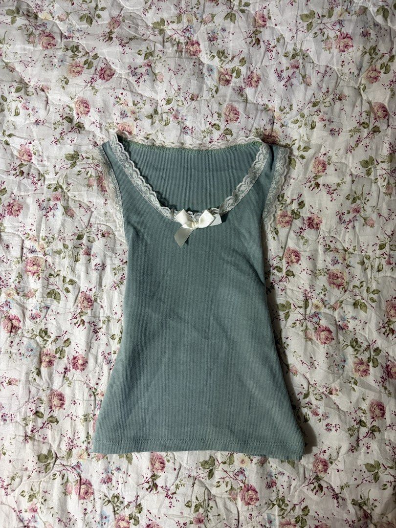Dusty Teal Lace Bow Cami Top (Category: Sleeveless) located in Muntinlupa City. Submitted by herellas0504 (Listing ID 1469300147, Image 1). Description: Dusty Teal Lace Bow Cami Top Mine: 150 | Lock: 200 ———————————— size: xs-med no issue.