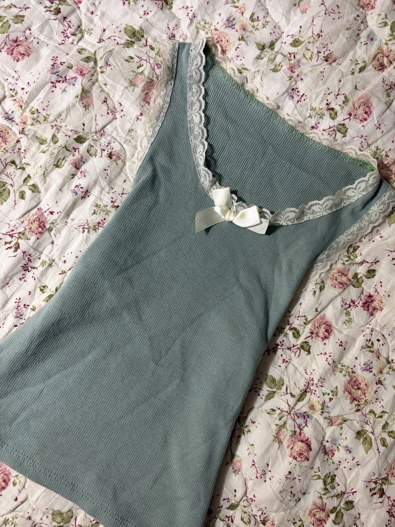 Dusty Teal Lace Bow Cami Top (Category: Sleeveless) located in Muntinlupa City. Submitted by herellas0504 (Listing ID 1469300147, Image 2). Description: Dusty Teal Lace Bow Cami Top Mine: 150 | Lock: 200 ———————————— size: xs-med no issue.