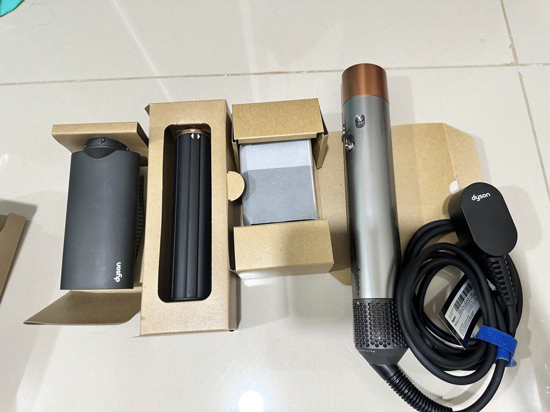 Dyson Airwrap Origin (Category: Hair) located in Marikina City. Submitted by s_c08 (Listing ID 1469176310, Image 1). Description: Selling my Dyson Airwrap Origin Bought last 29 Aug 2026 from Laz 100% no issue, complete set with warranty Orig price: 19k selling for only 15k (slightly nego) RFS: Switched to GHD.