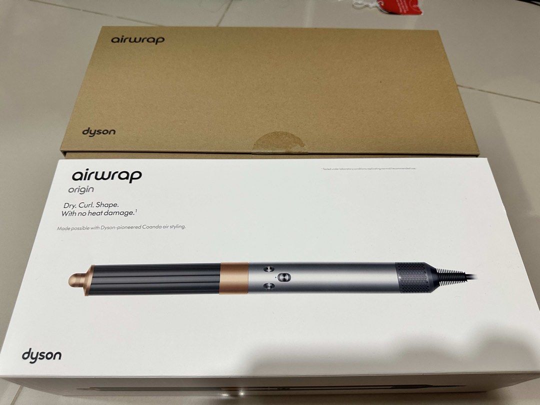 Dyson Airwrap Origin (Category: Hair) located in Marikina City. Submitted by s_c08 (Listing ID 1469176310, Image 2). Description: Selling my Dyson Airwrap Origin Bought last 29 Aug 2026 from Laz 100% no issue, complete set with warranty Orig price: 19k selling for only 15k (slightly nego) RFS: Switched to GHD.