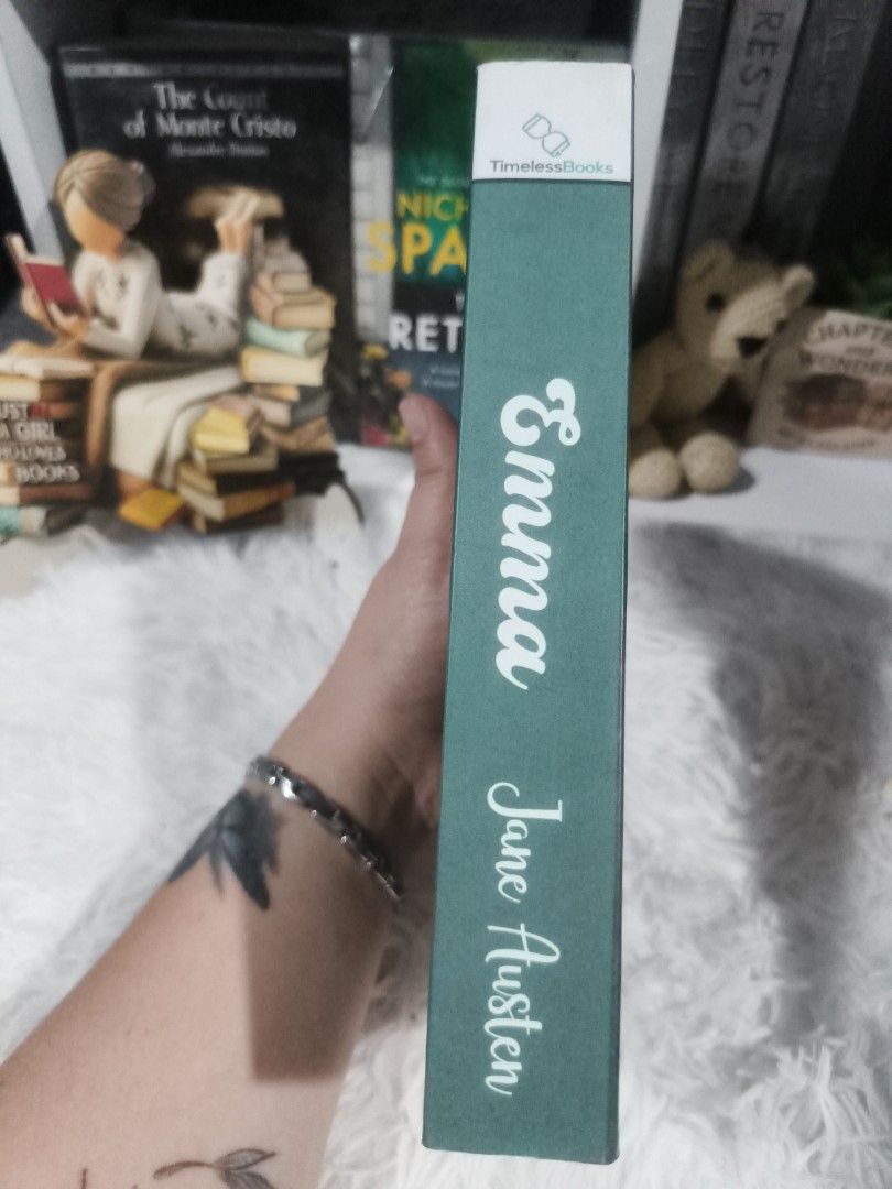 Emma by Jane Austen Timeless Books Edition (Category: Storybooks) located in Cabuyao City. Submitted by chaptersandwonders143 (Listing ID 1469307491, Image 3). Description: - Title: Emma by Jane Austen - Edition: Timeless Books paperback - Design: Dark green cover with silhouette illustration and decorative floral borders - Size: Standard paperback - Synopsis: Follows Emma Woodhouse and her 19th-century matchmaking adventures - Condition: WITH FO