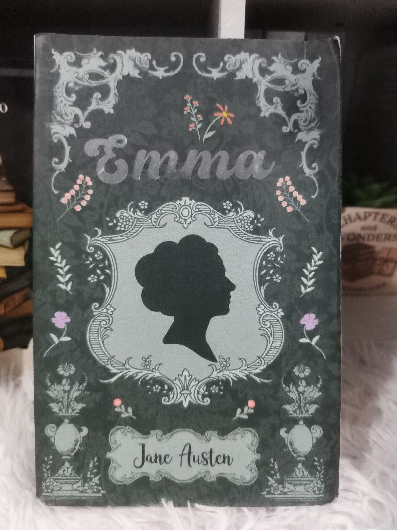 Emma by Jane Austen Timeless Books Edition (Category: Storybooks) located in Cabuyao City. Submitted by chaptersandwonders143 (Listing ID 1469307491, Image 1). Description: - Title: Emma by Jane Austen - Edition: Timeless Books paperback - Design: Dark green cover with silhouette illustration and decorative floral borders - Size: Standard paperback - Synopsis: Follows Emma Woodhouse and her 19th-century matchmaking adventures - Condition: WITH FO