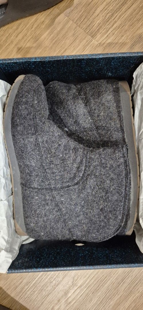 EMU Australia Grey Wool Felt Boots (Category: Boots) located in Makati City. Submitted by razorheadachemanila (Listing ID 1469233640, Image 1). Description: - Brand: EMU Australia - Style: Felt boots with stitched panel details and rounded toe - Color: Dark grey - Material: Cozy wool upper with a flexible, high-grip rubber sole - Fit: Ankle-height - Inclusions: Original shoebox included - Condition: Excellent, well-kept - Mode of Payment: GCash, 