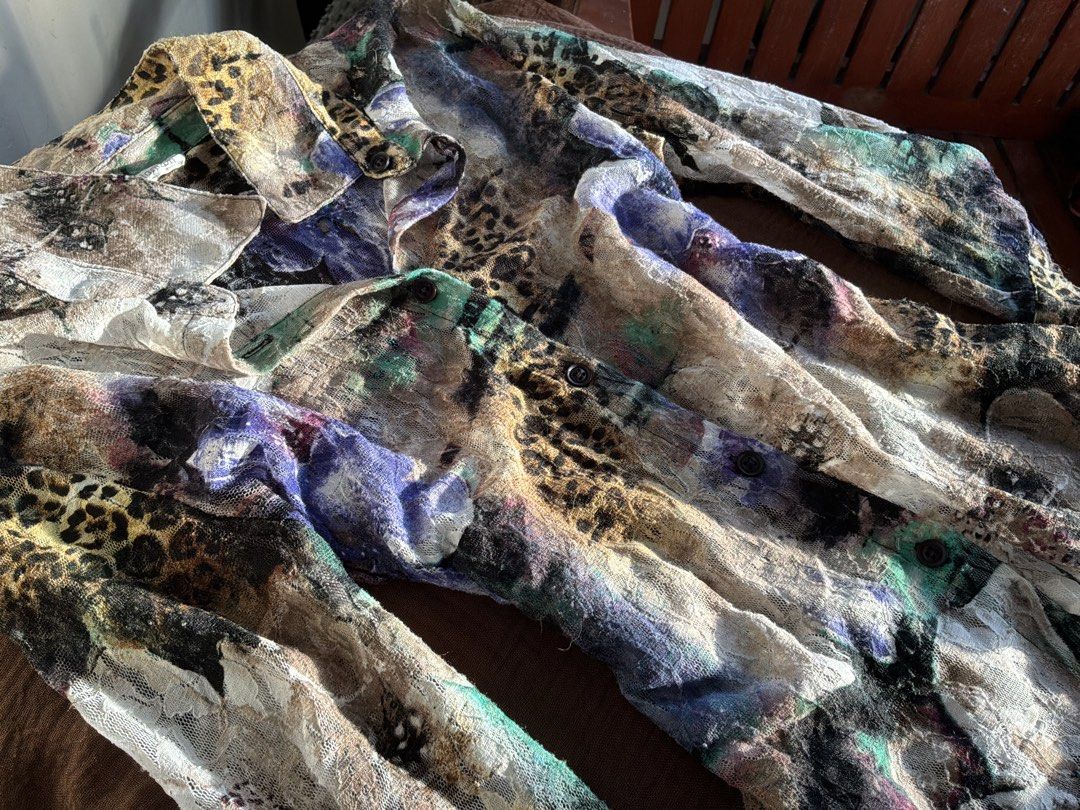 Erin London Multi-colored Pattern Long Sleeve Blouse Size M (Category: Longsleeves) located in Dumaguete. Submitted by _l1lyy_ (Listing ID 1469246940, Image 3). Description: - Relaxed loose fit type, semi sheer - Brand: Erin London - Size: Medium to Large Frames - Blouse: Button-down front with collar, semi-sheer textured material, and a multi-colored abstract leopard/floral print - Vest: Separate dark grey button vest featuring playful ruffles a