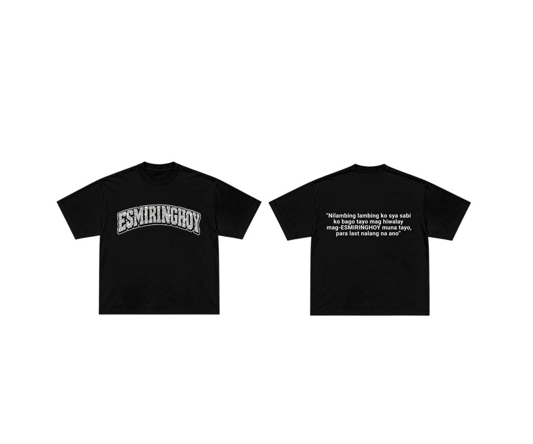 ESMIRINGHOY Black Graphic Tee (Category: Tshirts & Polo Shirts ) located in Quezon City. Submitted by gladysgeron (Listing ID 1469269529, Image 2). Description: - Color: Solid black - Material: Heavyweight cotton fabric - Fit: Relaxed fit with streetwear aesthetic - Design: Bold collegiate text on the chest - Back Print: Funny Tagalog quote in white lettering ("Nilambing lambing ko sya sabi ko bago tayo mag hiwalay mag-ESMIRINGHOY muna tayo, para