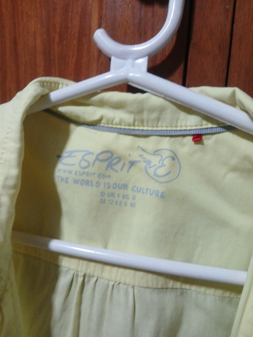 Esprit Yellow Short Sleeve Button Up Shirt (Category: Tshirts & Polo Shirts ) located in Malolos. Submitted by mockingjay.0308 (Listing ID 1469205446, Image 3). Description: - Brand: Esprit - Color: Bright yellow - Style: Short sleeve button-up shirt with collar - Size: 38 / UK 12 / US 8 - Material: Lightweight and breathable, great for warm weather Note: There is a little stain sa underarm lng due to deodorant stain but still presentable .