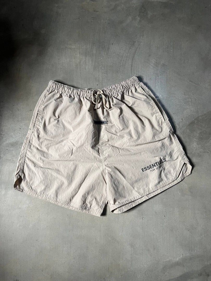 Essentials nylon short (Category: Shorts) located in Polangui. Submitted by jamessaintlaurent (Listing ID 1469192751, Image 1). Description: W:32-36 L: 18 minimal issue check pic still in good condition.