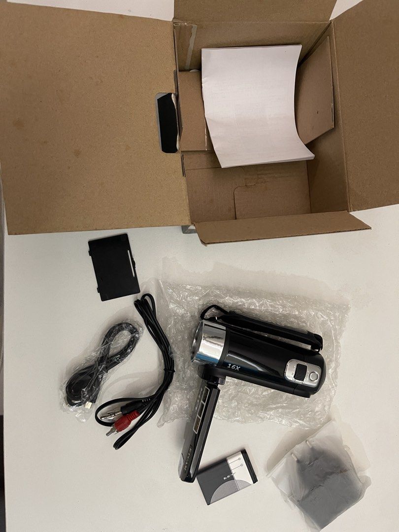 ETCAM HD 1080P Digital Video Camera Recorder (Category: Cameras) located in Pasig City. Submitted by altopentle (Listing ID 1469210544, Image 2). Description: - Brand: ETCAM HD 1080P Digital Video Camera Recorder - Condition: Like new (unpacked for photos only) - Color: Sleek black finish with attached hand strap and swivel screen - Resolution: Full HD 1080P video recording with 16.0 Megapixels - Zoom: 16X digital zoom - Inclusions: Original box,