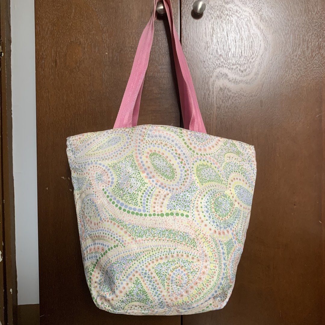 Etro Reversible Tote Bag (Category: Tote Bags) located in Mandaluyong City. Submitted by gentle.segoviajam (Listing ID 1469322523, Image 3). Description: Authentic reversible Etro tote bag featuring a vibrant abstract pattern on one side and a pastel dotted paisley design on the other. Lightweight with pink canvas straps and an exterior zip pocket. Perfect for daily use. Mopup / Ship nationwide..