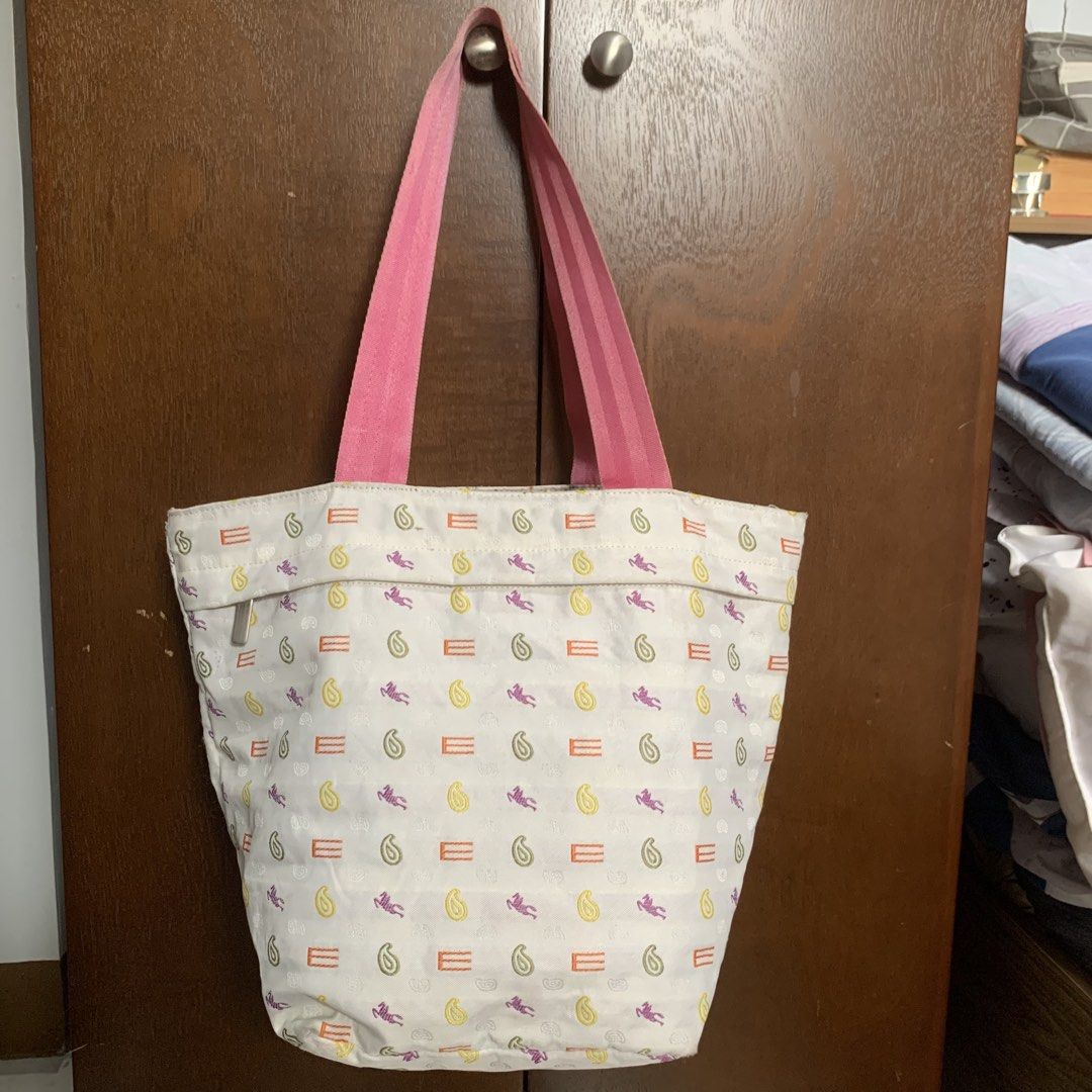 Etro Reversible Tote Bag (Category: Tote Bags) located in Mandaluyong City. Submitted by gentle.segoviajam (Listing ID 1469322523, Image 2). Description: Authentic reversible Etro tote bag featuring a vibrant abstract pattern on one side and a pastel dotted paisley design on the other. Lightweight with pink canvas straps and an exterior zip pocket. Perfect for daily use. Mopup / Ship nationwide..