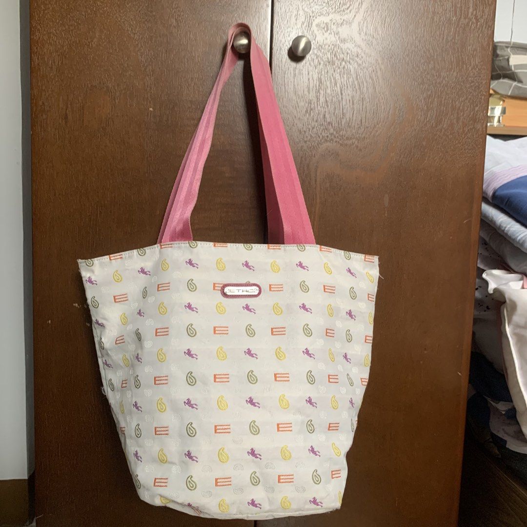 Etro Reversible Tote Bag (Category: Tote Bags) located in Mandaluyong City. Submitted by gentle.segoviajam (Listing ID 1469322523, Image 1). Description: Authentic reversible Etro tote bag featuring a vibrant abstract pattern on one side and a pastel dotted paisley design on the other. Lightweight with pink canvas straps and an exterior zip pocket. Perfect for daily use. Mopup / Ship nationwide..