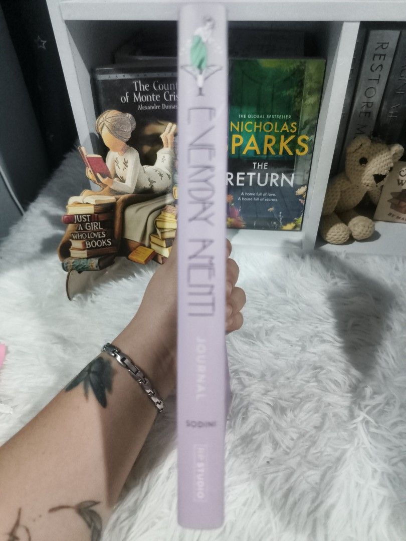 Everyday Amenti: A Guided Journal by Jennifer Sodini (Category: Storybooks) located in Cabuyao City. Submitted by chaptersandwonders143 (Listing ID 1469307716, Image 3). Description: - Title: Everyday Amenti by Jennifer Sodini (Published by RP Studio) - Features: Weekly prompts, guided meditations, and colorful illustrations by Natalee Miller - Design: Gorgeous purple hardcover edition with stunning artwork throughout - Condition: Clean pages ins