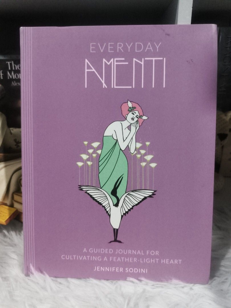 Everyday Amenti: A Guided Journal by Jennifer Sodini (Category: Storybooks) located in Cabuyao City. Submitted by chaptersandwonders143 (Listing ID 1469307716, Image 1). Description: - Title: Everyday Amenti by Jennifer Sodini (Published by RP Studio) - Features: Weekly prompts, guided meditations, and colorful illustrations by Natalee Miller - Design: Gorgeous purple hardcover edition with stunning artwork throughout - Condition: Clean pages ins