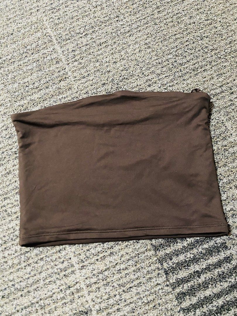 FB Sister brown tube top size S (Category: Sleeveless) located in Marikina City. Submitted by jessylady10 (Listing ID 1469329721, Image 1). Description: - Brand: FB Sister - Size: Small - Color: Brown - Material: Stretchy fabric (Made in Bangladesh) - Style: Simple strapless tube top - Condition: Worn a few times, still plenty of life left - Styling tip: Pairs great with high-waisted jeans or skirts!.