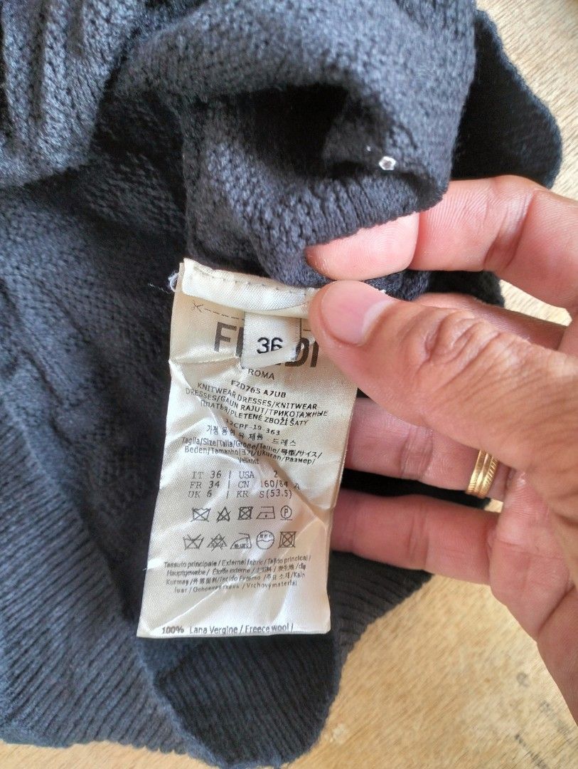 Fendi cardigan knitted (Category: Luxury Apparel) located in San Carlos City. Submitted by guioverlua72920 (Listing ID 1469203393, Image 3). Description: Fendi cardigan knitted size 36 on tag excellent condition no issue ₱1000+sf location San Carlos city Negros Occidental.