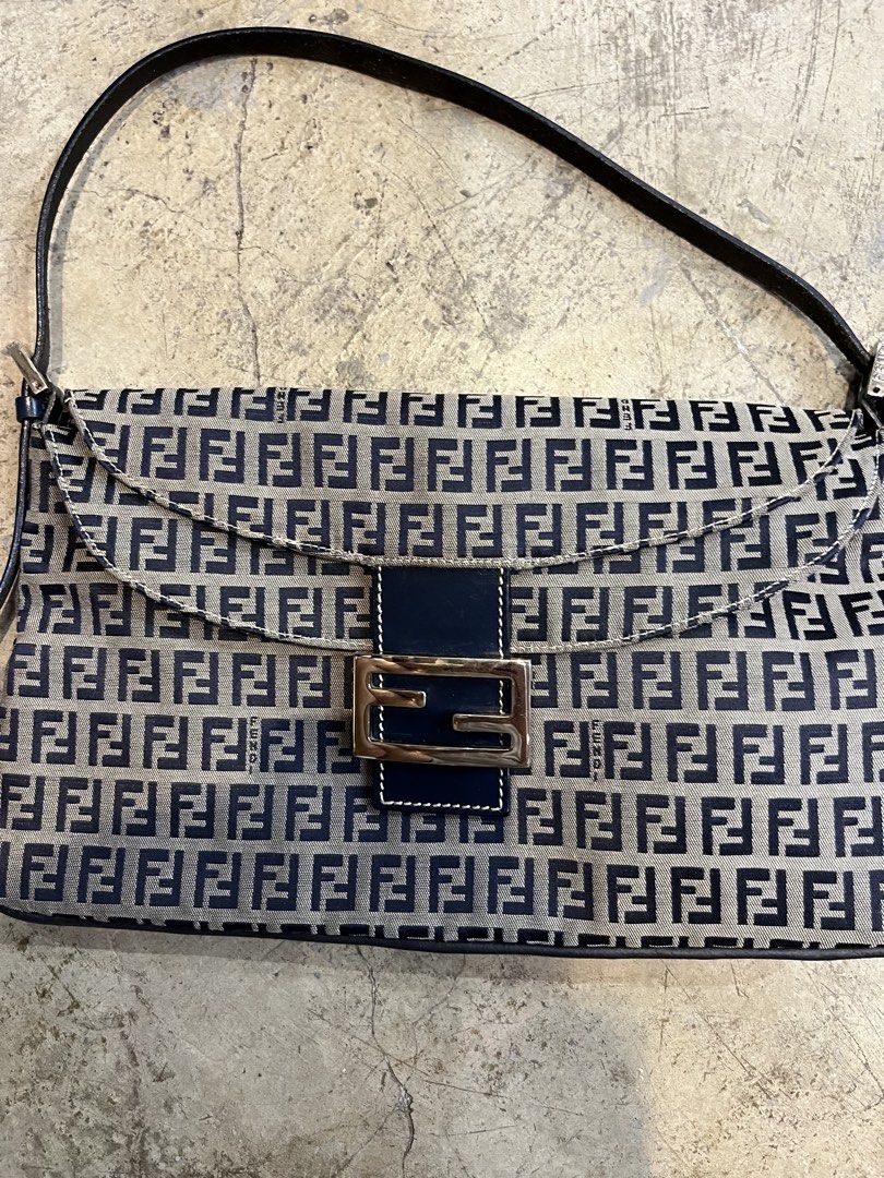FENDI DOUBLE FLAP BAGUETTE (Category: Luxury Bags & Wallets) located in Baguio. Submitted by closetgc.clothingshop (Listing ID 1469202527, Image 2). Description: Fendi double flap baguette monogram In excellent condition even if its vintage. Guaranteed authentic .