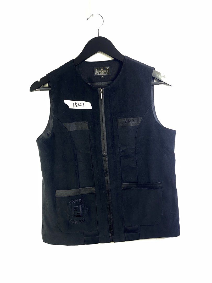 Fendi Jeans Black Zip-Up Vest Size M (Category: Sleeveless) located in Manila. Submitted by declutterpromax (Listing ID 1469202313, Image 1). Description: - Brand: Fendi Jeans - Style: Black zip-up vest with branded metal pull - Size: Medium (tag on collar) - Details: Embroidered Fendi logo, front patch pocket, two satin-trimmed front pockets - Origin: Made in Italy (Alias S.p.A. production) - Condition: Clean and classic design, ready to wear.