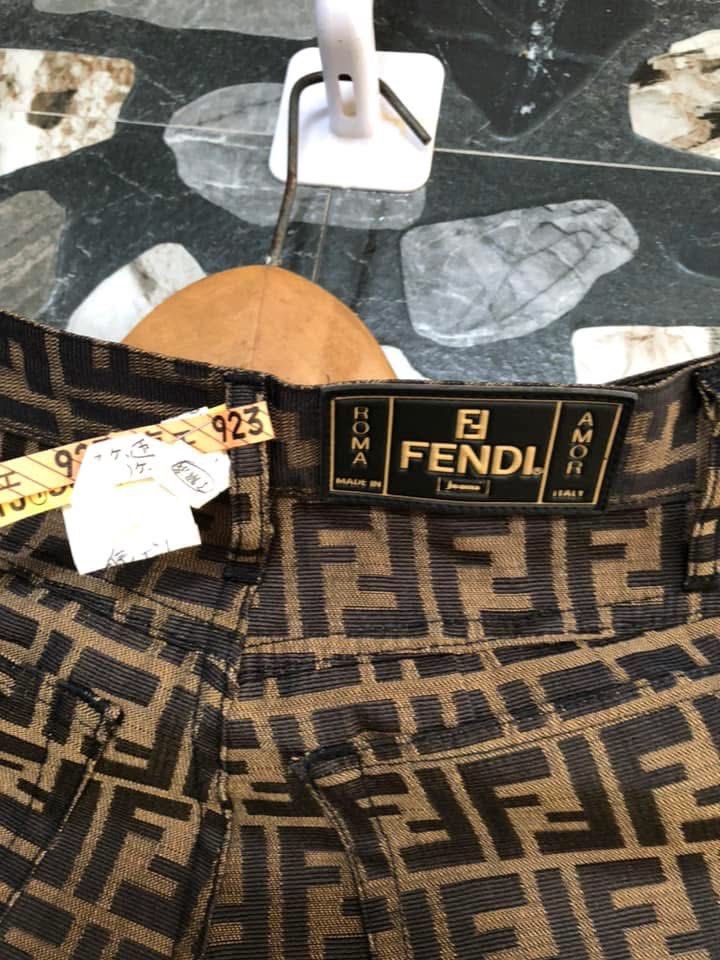 Fendi Jeans Brown FF Monogram Denim Pants Size 28 (Category: Jeans) located in Bacolod City. Submitted by chuchaystuffs (Listing ID 1469216762, Image 3). Description: - Brand: Fendi Jeans - Color/Pattern: Brown with all-over FF monogram - Size: 28-inch waist (High waist fit) - Origin: Made in Italy - Closure: Front button and zip - Details: Features original Fendi Jeans back waistband label - Condition: Good vintage condition with a minor fabric 