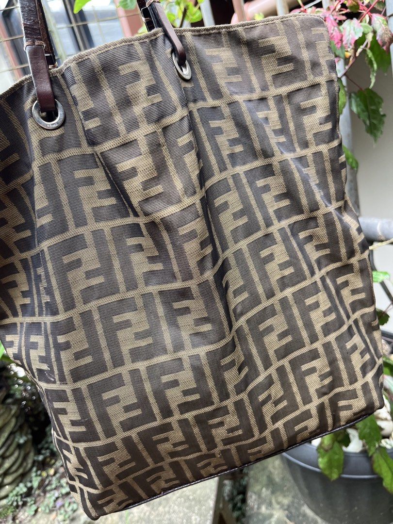 FENDI ZUCCA TOTE BAG (Category: Luxury Bags & Wallets) located in Baguio. Submitted by closetgc.clothingshop (Listing ID 1469214190, Image 2). Description: Fendi Zucca Tote bag Guaranteed authentic Medium size AB+ ( very good ) normal sign of usage lang po sa leather .
