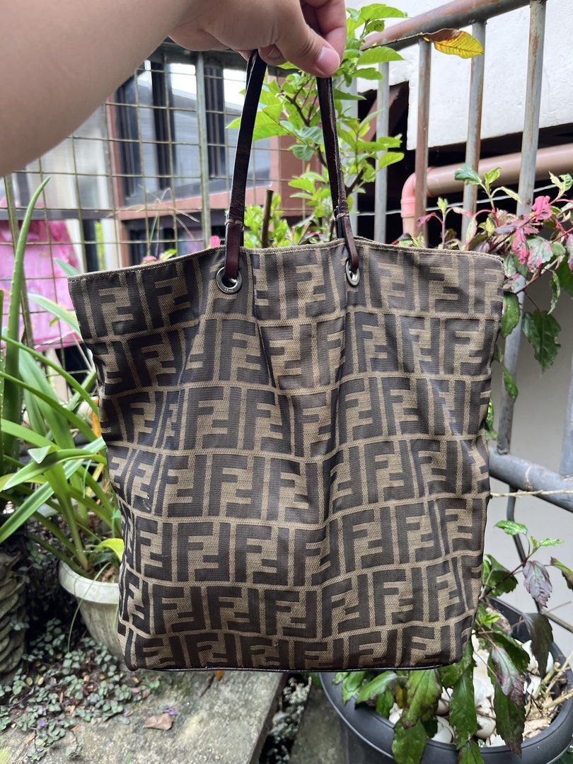 FENDI ZUCCA TOTE BAG (Category: Luxury Bags & Wallets) located in Baguio. Submitted by closetgc.clothingshop (Listing ID 1469214190, Image 1). Description: Fendi Zucca Tote bag Guaranteed authentic Medium size AB+ ( very good ) normal sign of usage lang po sa leather .