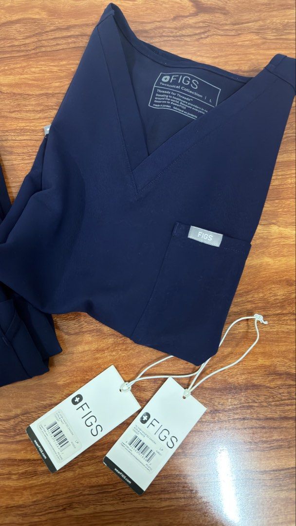 Figs Scrub Suit - Navy Blue (Category: Medical Supplies & Tools) located in Manila. Submitted by emxsi_ (Listing ID 1469240697, Image 2). Description: Catarina Top - Large Petite Zamora Jogger Pants - Large Petite Lightly Used - Good Condition.