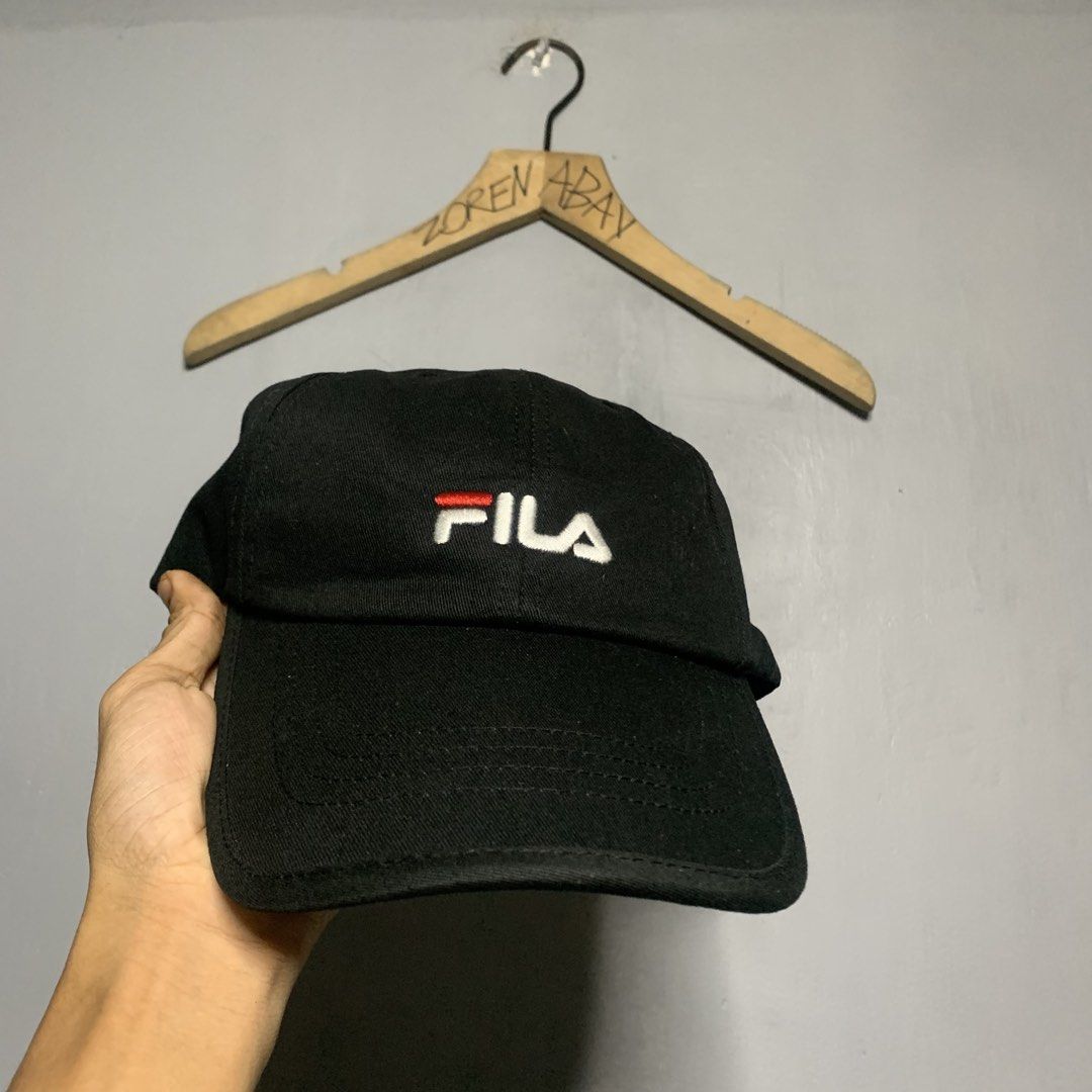 Fila Black Baseball Cap Embroidered Logo Hat (Category: Caps & Hats) located in Manila. Submitted by emplysthrift. (Listing ID 1469221618, Image 1). Description: Adult Size Excellent Condition Colorrate: 9.8/10 Flaws: needwash only Unli vouch/vc for safe transactions 📲 Location: Laspinas City, Metro Manila, Brngy Talon Uno. 📍 DM IF INTERESTED📥 - Brand: Fila - Color: Classic black with white and red embroidered front logo - Design: Standard 6-p