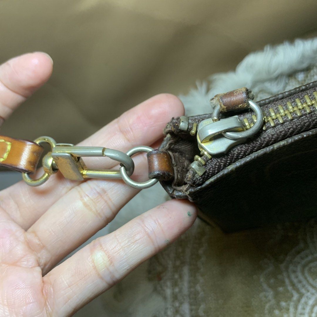 FION Monogram Brown Shoulder Bag (Category: Luxury Bags & Wallets) located in Mandaluyong City. Submitted by gentle.segoviajam (Listing ID 1469322996, Image 3). Description: Authentic FION brown monogram shoulder bag with tan leather trim. Features a secure zip top, fabric-lined interior with pockets, and minor hardware tarnishing. Perfect everyday compact bag!.