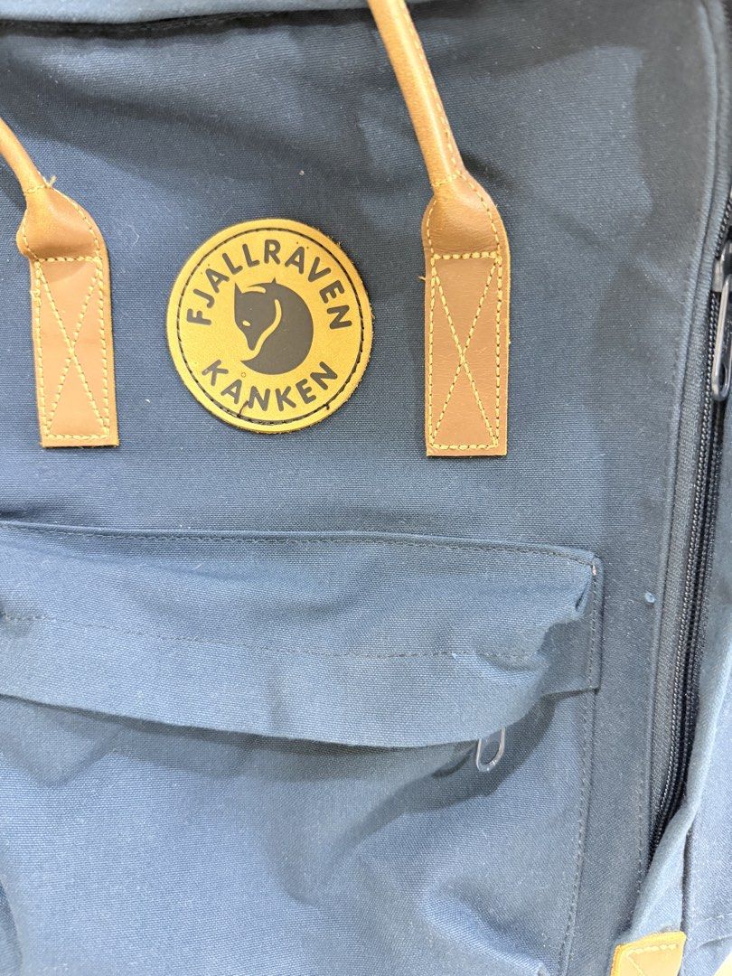 Fjallraven Kanken No.2 Backpack Dark Navy (Category: Backpacks) located in Manila. Submitted by haveago0dthrift (Listing ID 1469281919, Image 2). Description: - Model: Fjällräven Kånken No. 2 - Color: Dark Navy Blue with Brown Leather handles and details - Material: Highly durable G-1000 HeavyDuty - Compartments: Classic zipped front pocket and two side pockets - Condition: Interior name label and wash care tag fully intact - Features: Adjustable