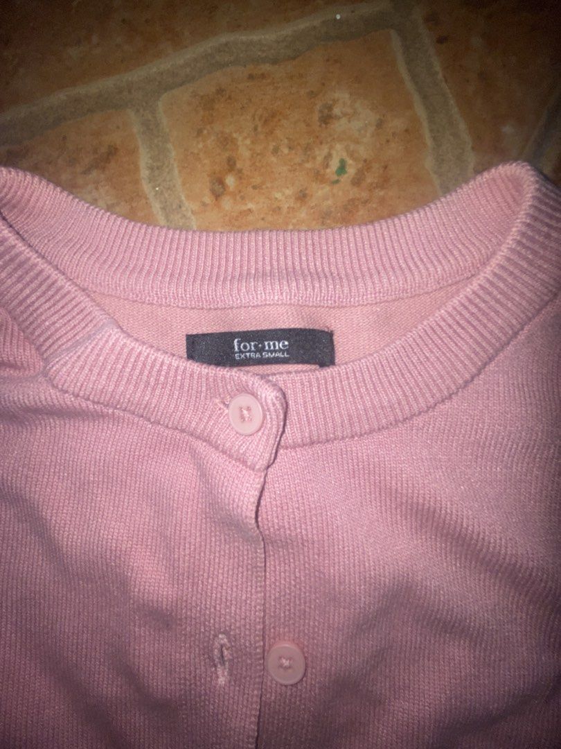 for me Pink Knit Cardigan Extra Small (Category: Coats, Jackets and Outerwear) located in Manila. Submitted by bravecloud.304b93 (Listing ID 1469180091, Image 2). Description: - Brand: For Me - Item: Pink knit cardigan - Size: Extra Small (XS) tag attached - Design: Button-down front with ribbed neckline, cuffs, and hem - Material: Soft, lightweight knit fabric - Fit: Easy layering piece for any outfit.