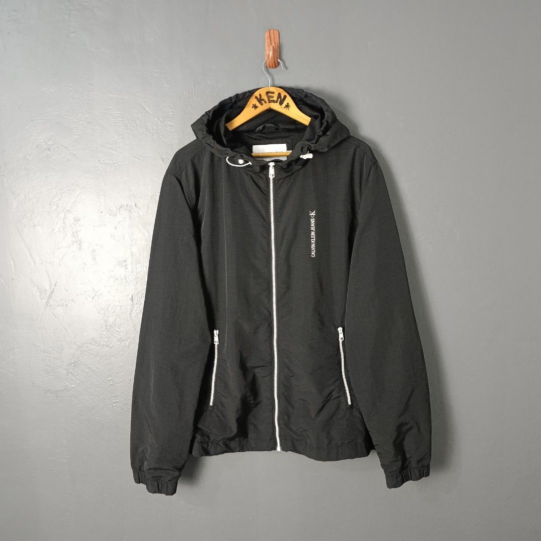 For Men - Calvin Klein - Vertical Logo (Category: Coats, Jackets and Outerwear) located in Bacolod City. Submitted by drop.ph (Listing ID 1469260545, Image 2). Description: Calvin Klein - Vertical Logo Windbreaker Authentic *Size XL - 25x28 *Excellent *No Flaws *Price: 1,800php *Add SF if outside Bacolod City .