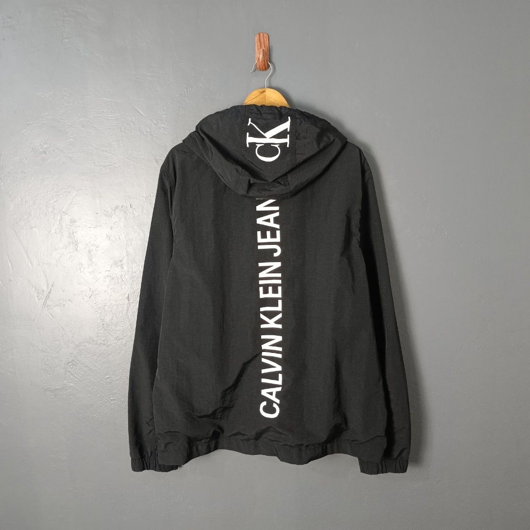 For Men - Calvin Klein - Vertical Logo (Category: Coats, Jackets and Outerwear) located in Bacolod City. Submitted by drop.ph (Listing ID 1469260545, Image 1). Description: Calvin Klein - Vertical Logo Windbreaker Authentic *Size XL - 25x28 *Excellent *No Flaws *Price: 1,800php *Add SF if outside Bacolod City .