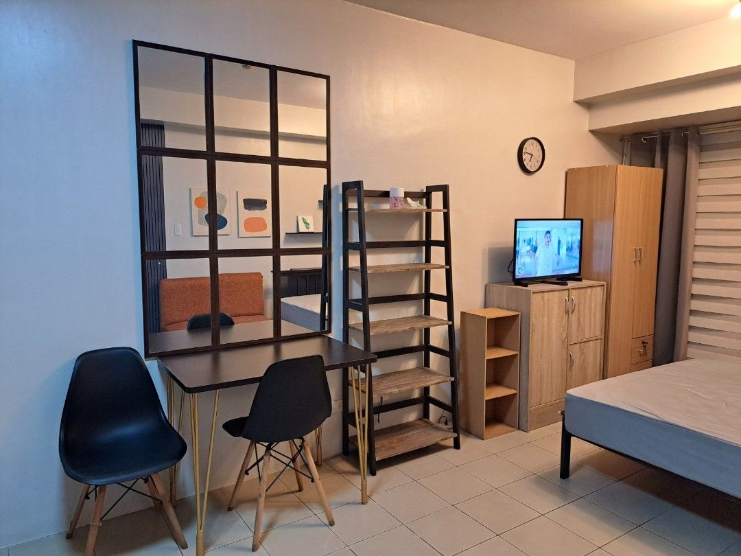 For Rent Studio Unit at Avida San Lorenzo (Category: Apartments & Condos) located in Santa Rosa. Submitted by oldczar68 (Listing ID 1463521483, Image 3). Description: 23 sqm Fully furnished Studio unit located at 17th floor facing Amenities area - Double sized bed with metal frame and mattress - Clothes cabinet - Dining table with 2 chairs - Lounge chair x 2 - Aircon - Electric fan - Microwave oven - Induction Oven - Rice Cooker - Electric Kettle