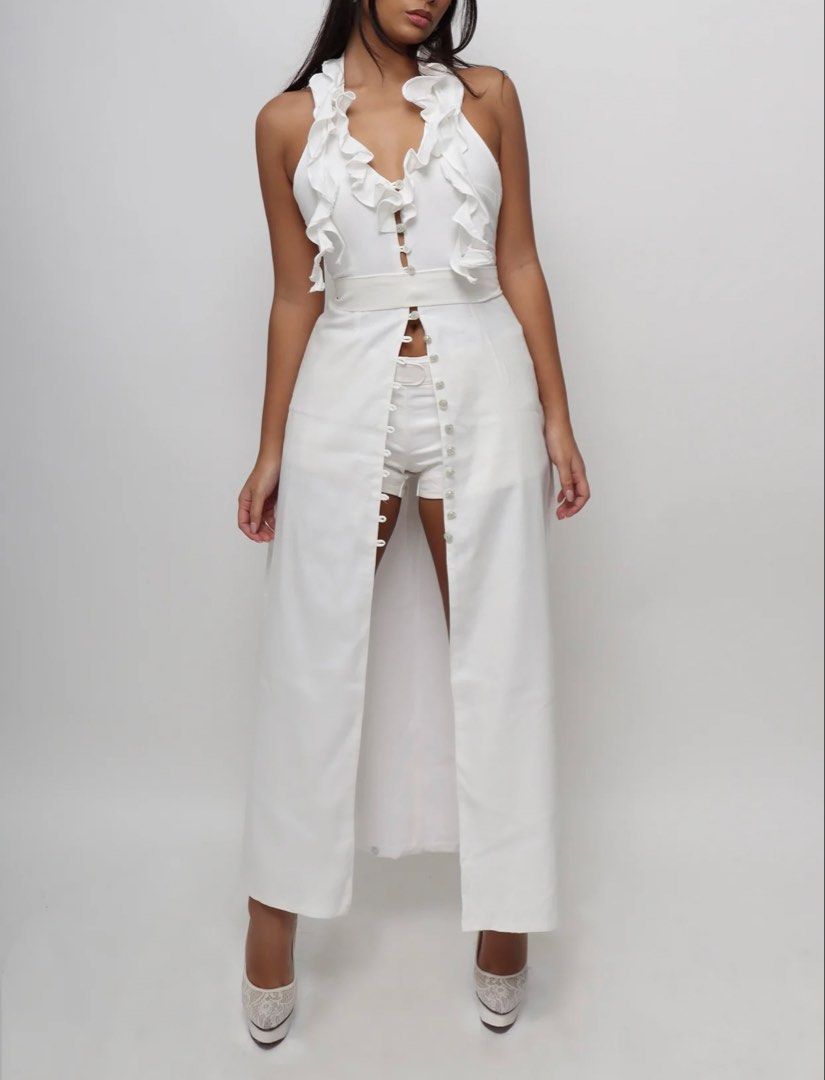 FOR RENT: White Ruffle Long Halter Backless Dress (Category: Dresses) located in Paranaque City. Submitted by prelovedbyleigh (Listing ID 1466257751, Image 1). Description: Bust: 32, Waist: 25, Hips: 36 The Paloma Modular Dress combines breathable linen with a soft 100% cotton lining. Its innovative design features a modular ruffle and adjustable neck length system, using hidden buttons that secure ruffles discreetly inside the skirt lining. Pair
