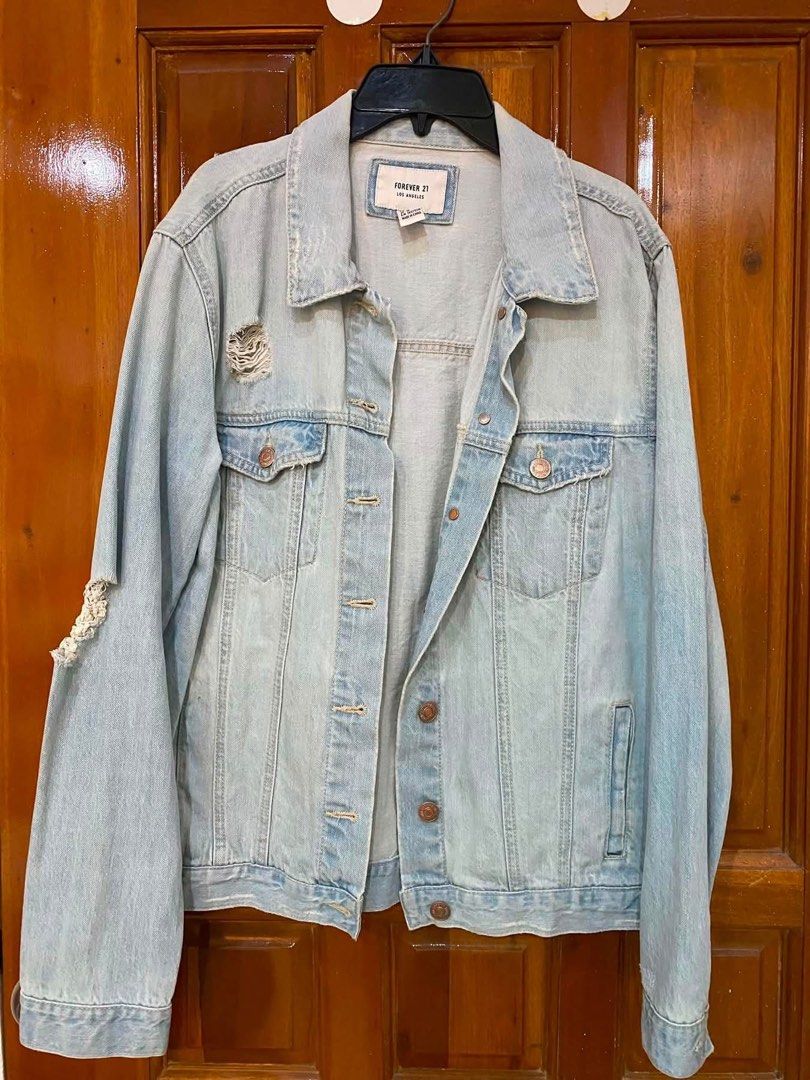 Forever 21 Light Wash Distressed Denim Jacket (Category: Coats, Jackets and Outerwear) located in Antipolo. Submitted by mfl_08 (Listing ID 1469311240, Image 1). Description: - Size: Medium ❗️no ww pics ❗️non nego - shipping thru jnt or lalamove.