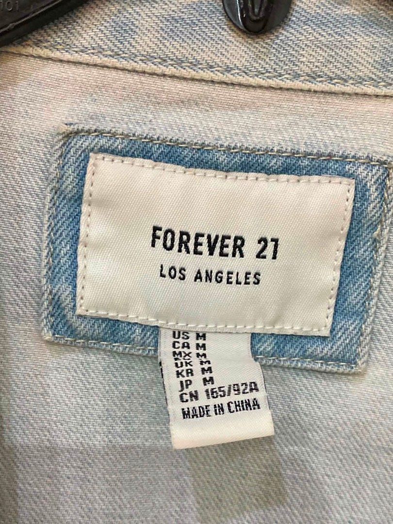 Forever 21 Light Wash Distressed Denim Jacket (Category: Coats, Jackets and Outerwear) located in Antipolo. Submitted by mfl_08 (Listing ID 1469311240, Image 2). Description: - Size: Medium ❗️no ww pics ❗️non nego - shipping thru jnt or lalamove.