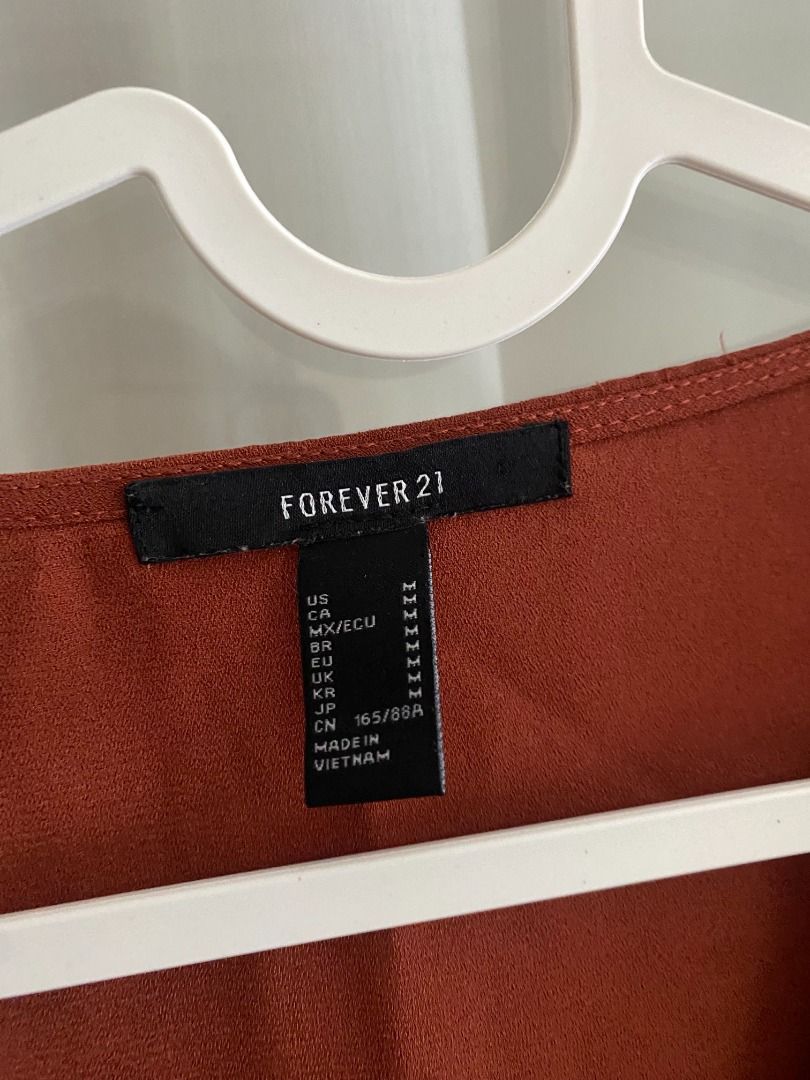 Forever 21 Rust Orange Office Top Medium (Category: Blouses) located in Quezon City. Submitted by jmxyz (Listing ID 1469203387, Image 3). Description: - size: medium 📍 greenfield, mandaluyong.