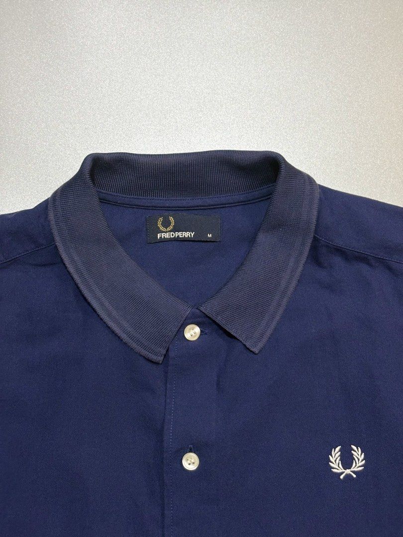 Fred Perry button down (Category: Tshirts & Polo Shirts ) located in Caloocan City. Submitted by thlyn (Listing ID 1469338355, Image 2). Description: As new condition .