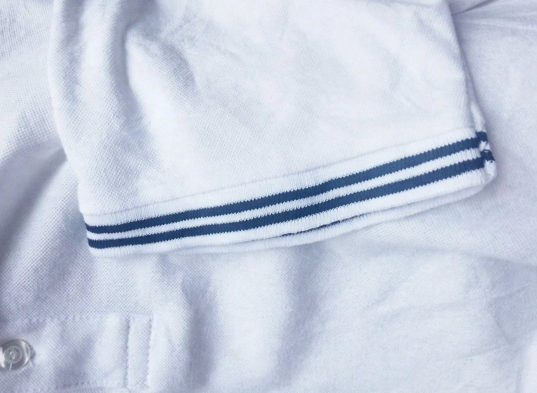 Fred Perry White Polo Shirt Size L (Category: Tshirts & Polo Shirts ) located in Digos. Submitted by echooo123 (Listing ID 1469237752, Image 3). Description: WTS: FRED PERRY POLO SHIRT💎 Size: Medium Dimes: 20x26 Good Condition Issue: remove washtags Need wash only Affordable Solid over all Cr: 9.7/10 DM: 📥.