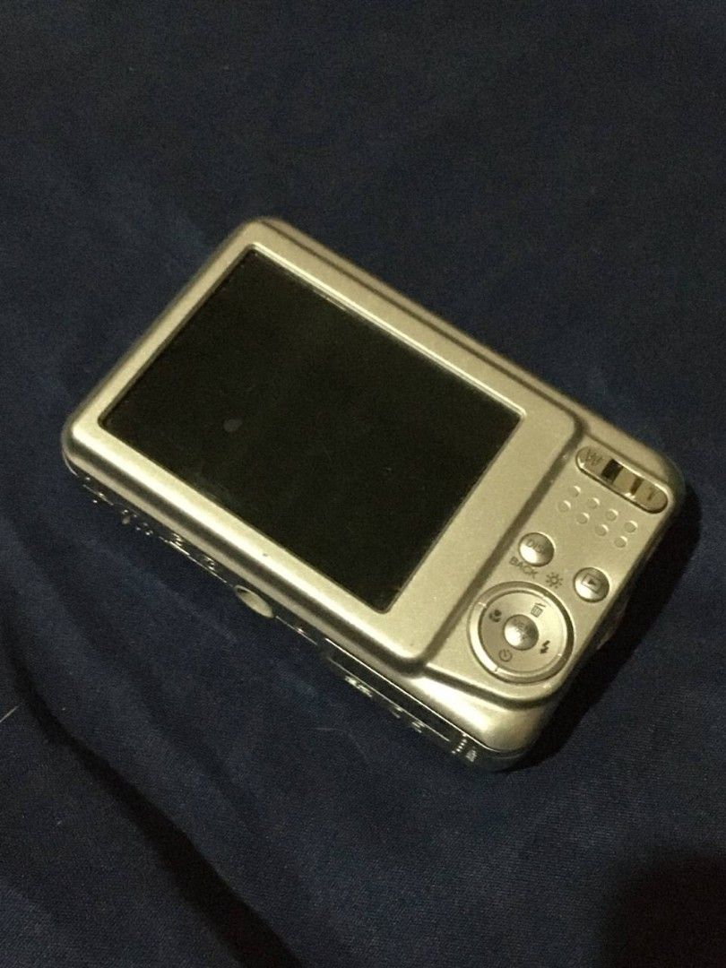 Fujifilm 12 Megapixels Digital Camera (Category: Cameras) located in Quezon City. Submitted by livkatecooke (Listing ID 1469369494, Image 2). Description: - Model: Fujifilm Compact Digital Camera (Silver) - Resolution: 12 Megapixels with built-in Fujinon zoom lens - Display: Standard rear LCD screen with easy navigation and playback controls - Design: Pocket-friendly, lightweight, and compact body style - Condition: Worn Out, selling for parts an