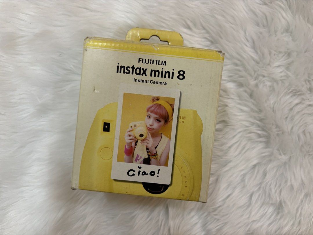 Fujifilm Instax Mini 8 Yellow Instant Camera with Box (Category: Cameras) located in Quezon City. Submitted by junventory (Listing ID 1469293977, Image 2). Description: - Bright yellow Fujifilm Instax Mini 8 instant camera - Point-and-shoot design prints credit card-sized photos instantly - Uses standard Instax Mini film packs - Comes with original matching wrist strap - Original retail box included - Perfect for parties, trips, and everyday snap