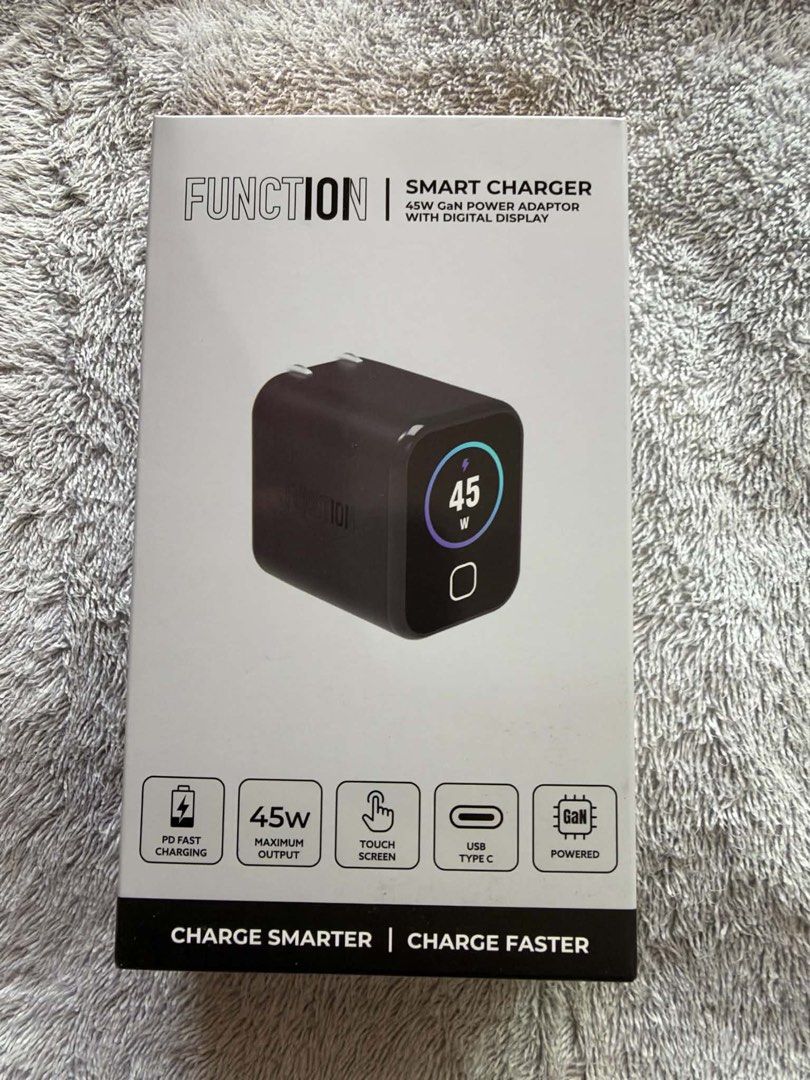 Function101 Smart Charger 45W (Category: Chargers & Cables) located in Quezon City. Submitted by skinniestdoctor (Listing ID 1469239126, Image 1). Description: - Brand new Function101 Smart Charger 45W GaN Power Adaptor (Dark Grey) - Features smart real-time touch screen digital display - PD Fast Charging with 45W maximum output via USB Type-C - Compact, travel-ready design equipped with convenient foldable prongs - Optimized for iPhone, and comp