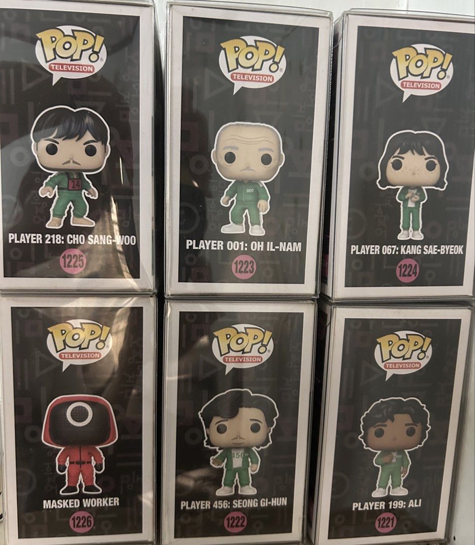 Funko Pop Squid Game Set of 6 Figures (Category: Designer & Blind Box Toys) located in Manila. Submitted by gamesstranded (Listing ID 1469208058, Image 2). Description: Full collection of six Squid Game Funko Pop Television vinyl figures. Includes Player 218 Cho Sang-Woo 1225, Player 001 Oh Il-Nam 1223, Player 067 Kang Sae-Byeok 1224, Masked Worker 1226, Player 456 Seong Gi-Hun 1222, and Player 199 Ali 1221. All boxes kept inside clear plastic pr