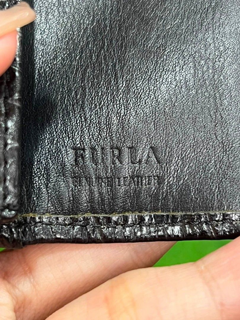 Furla Black Leather Wallet (Category: Luxury Bags & Wallets) located in Sorsogon. Submitted by ukay_finds9.9 (Listing ID 1469262355, Image 2). Description: Open for counter offer.