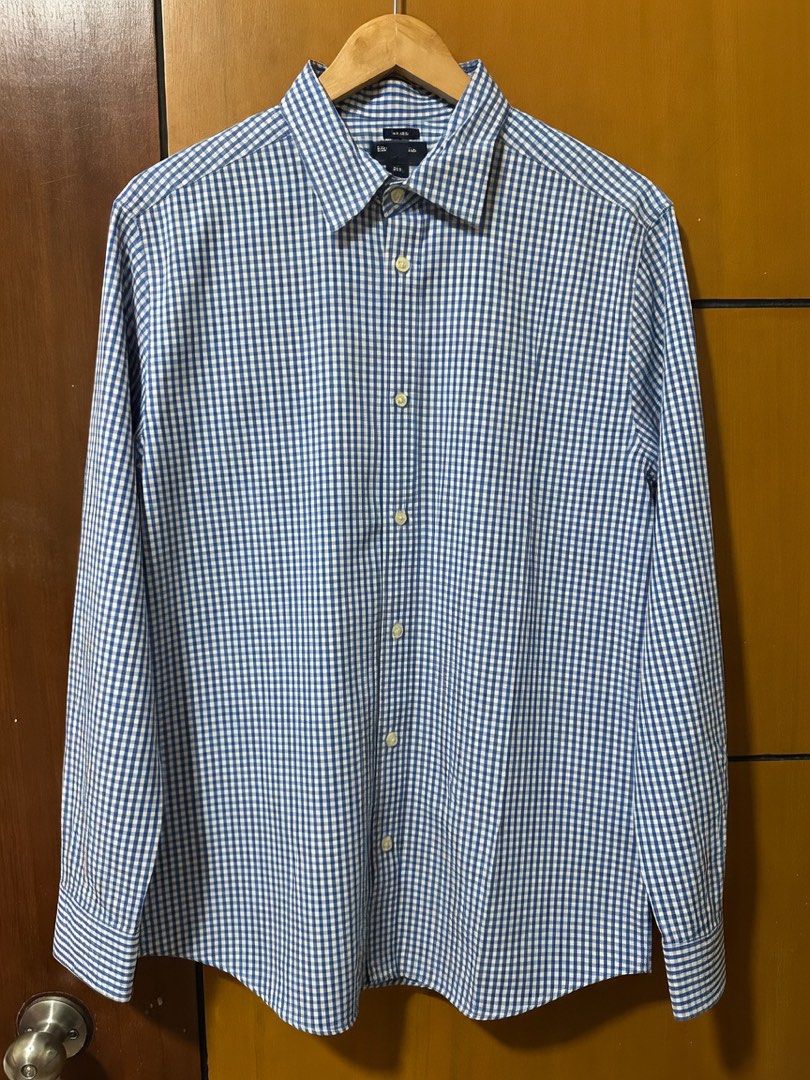 Gap Blue Gingham Non-Iron Button-Down Shirt (Category: Formal Shirts) located in Quezon City. Submitted by aussomefinds (Listing ID 1469250329, Image 1). Description: - Brand: Gap - Style: Blue and white gingham button-down shirt - Size: Large (Neck: 16-16.5) - Fit: Original fit - Fabric: Non-iron finish for low-maintenance care - Details: Long sleeves with button cuffs, standard collar - Origin: Made in Sri Lanka - Versatility: Perfect for both 