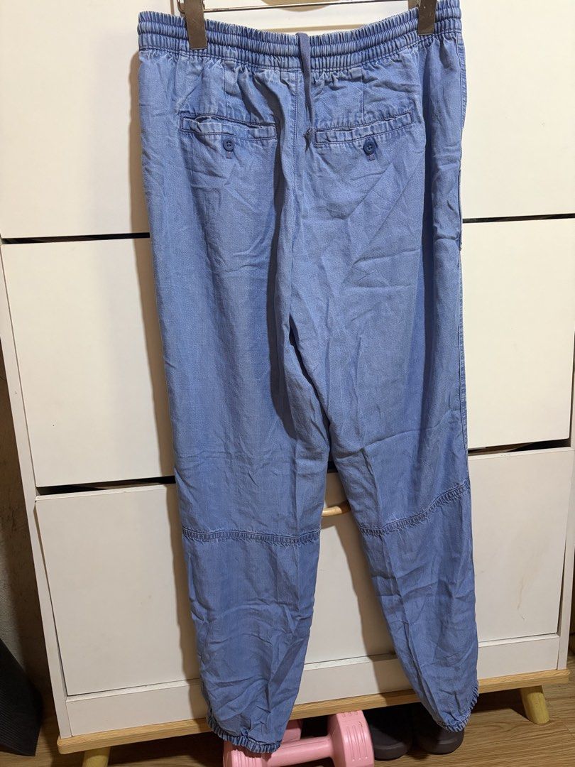 GAP Lyocell Jogger Pants Light Blue Size S (Category: Jeans) located in Siquijor. Submitted by yhostuff (Listing ID 1469178036, Image 3). Description: - Brand: GAP - tag Size: Small -actual size: M-Semi L - Color: Light Blue - Material: 100% Lyocell (ultra-soft, lightweight, and breathable) - Fit: Relaxed fit through the legs with knee seam details - Waistband: Elastic with adjustable drawstring - Pockets: Front patch pockets and back buttoned we
