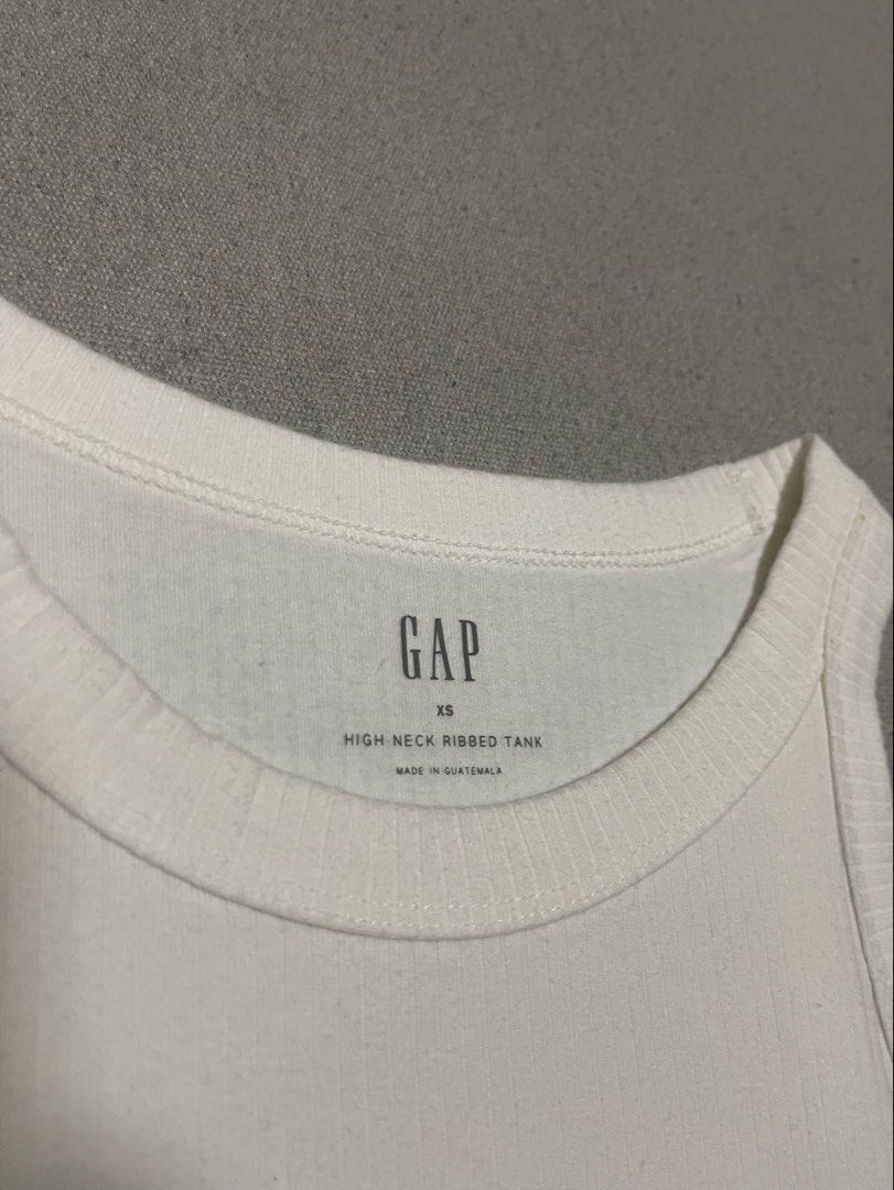 GAP Ribbed High Neck Tank (Category: Sleeveless) located in Bulacan. Submitted by sanjisthrift (Listing ID 1469318839, Image 3). Description: Size XSmall Width 14 Length 23 Excellent Condition 9/10.