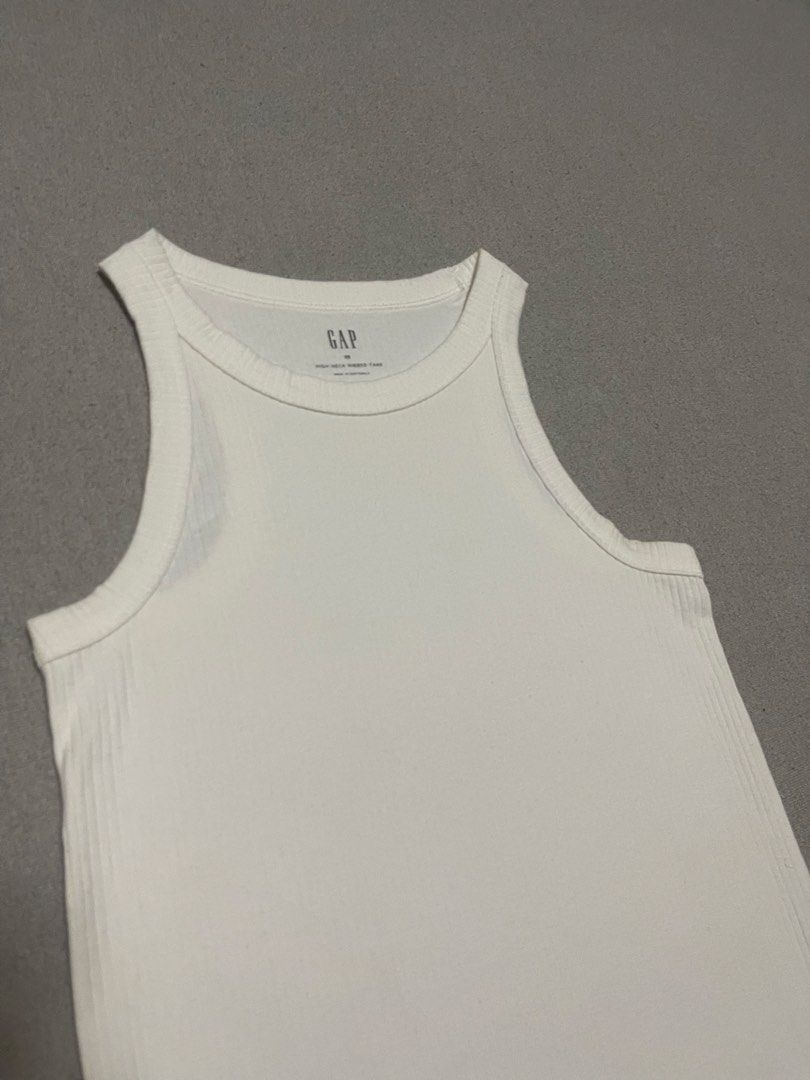GAP Ribbed High Neck Tank (Category: Sleeveless) located in Bulacan. Submitted by sanjisthrift (Listing ID 1469318839, Image 2). Description: Size XSmall Width 14 Length 23 Excellent Condition 9/10.