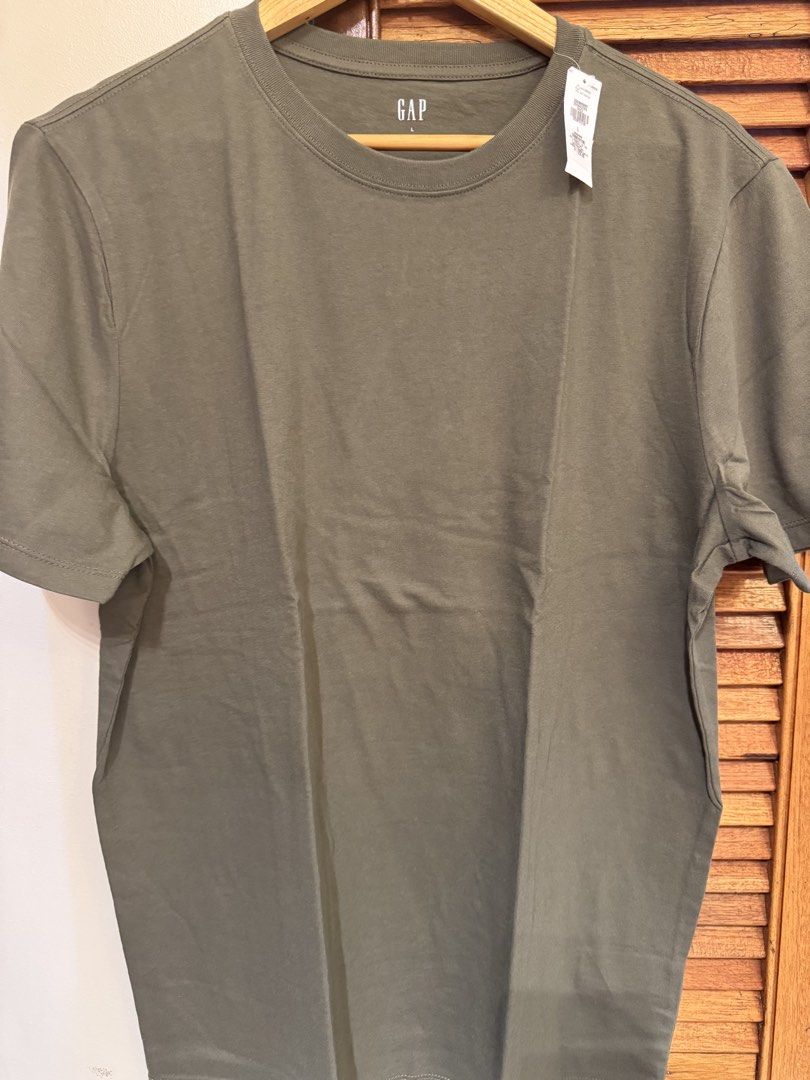 GAP Tshirt Take All 3 (Category: Tshirts & Polo Shirts ) located in Pasig City. Submitted by brothermikeandthe_mrs. (Listing ID 1467207270, Image 2). Description: GAP Tshirt Brand New with tag! ✔️Selling Price: Take All 3 for only P2,500 ✔️Price on Tag: P1,250 ✔️Original Size: Large - Width 22 inches Location: Pasig Colors: 1. Dark Green 2. Khaki on Tag (Beige) 3. Cedar on Tag .