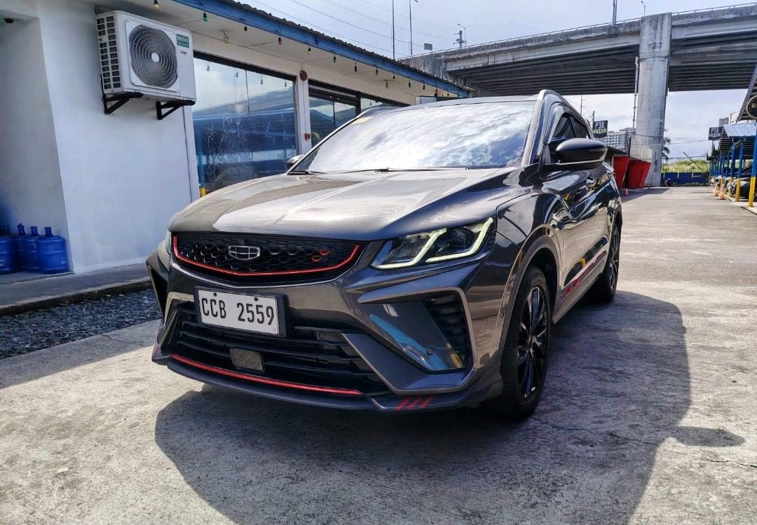 Geely Coolray Sport SE Auto (Category: Used Cars) located in Quezon City. Submitted by jayjet.jayjet (Listing ID 1469305930, Image 3). Description: 2023 GEELY COOLRAY SPORT SE Automatic Transmission 1st owned unit 29tkm only Push Start Engine Back Sensor with Camera Sunroof All Power All Original 1st Owned Unit No Issues No Accidents Mechanic Inspected Complete Tools, Jack and Spare Tire Price P568k Financing/Trade in accepted Sample Financing Co